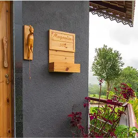 Magnolia cottage surrounded by greenery at Varuwoods eco resort